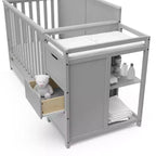 Lit de bébé évolutif avec tiroir et table à langer