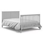 Lit de bébé évolutif avec tiroir et table à langer
