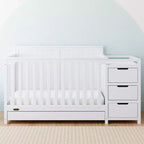 Lit de bébé évolutif avec tiroir et table à langer