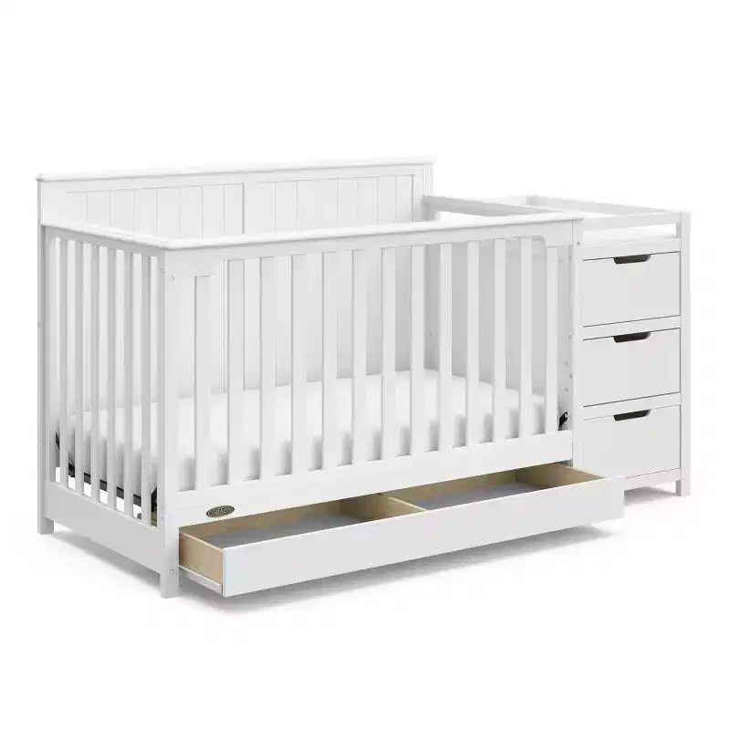 Lit de bébé évolutif avec tiroir et table à langer