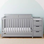 Lit de bébé évolutif avec tiroir et table à langer
