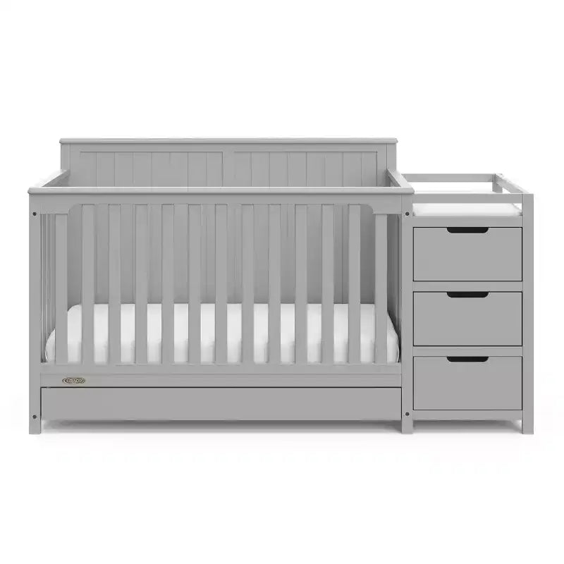 Lit de bébé évolutif avec tiroir et table à langer
