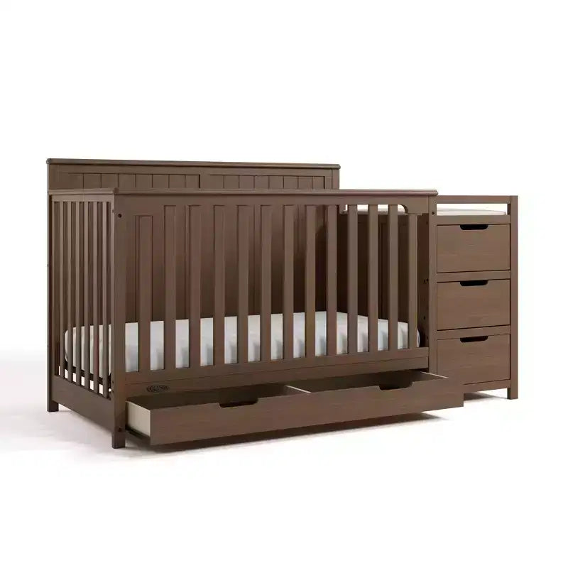 Lit de bébé évolutif avec tiroir et table à langer